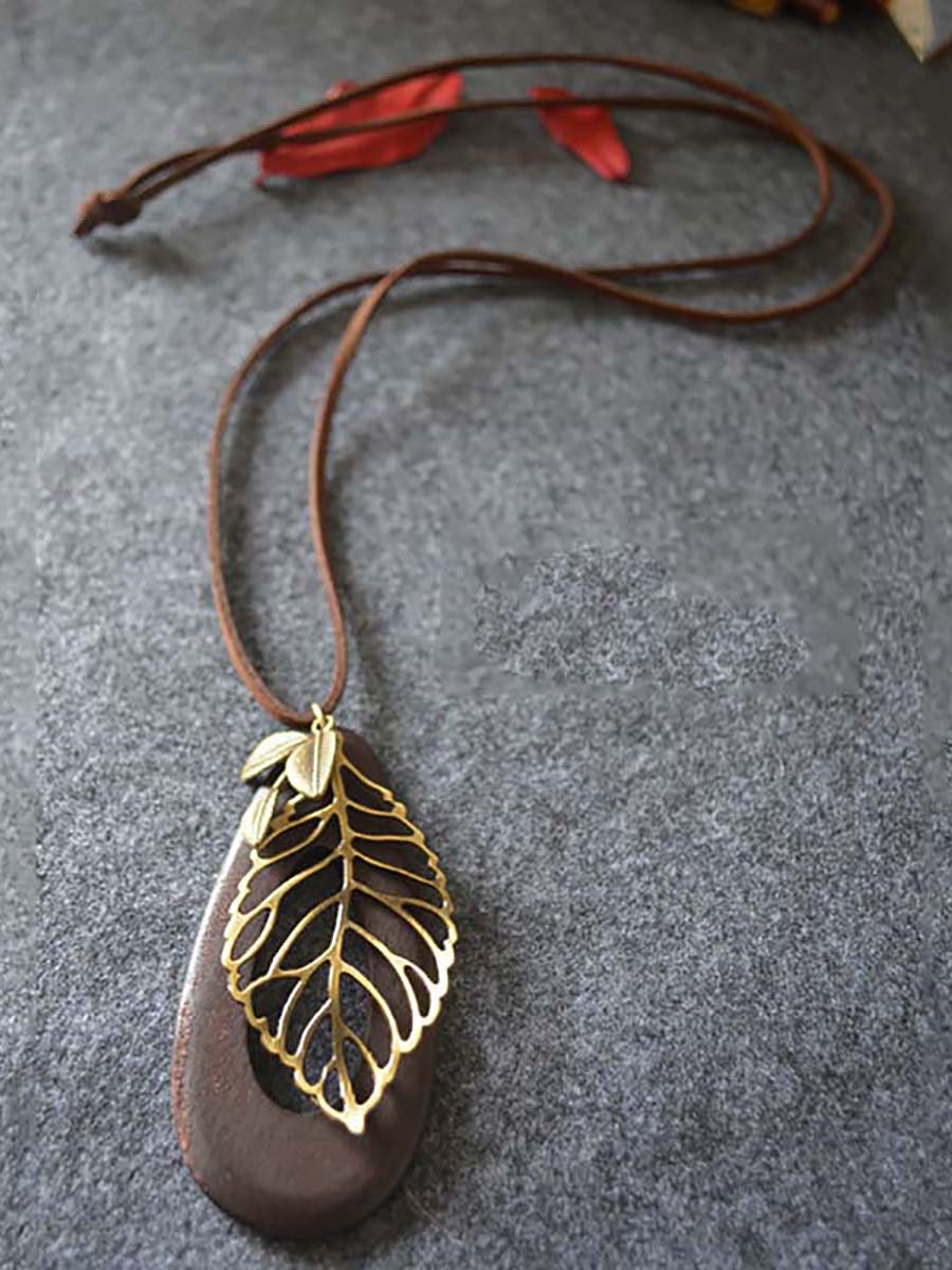 Artsy Hollow Out Metal Leaf Oval Wool Necklace AT1058