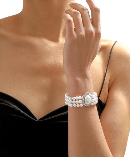 Elegant Gold Copper Alloy Pearl Zircon Resin Tassel Chain Bracelet YI001