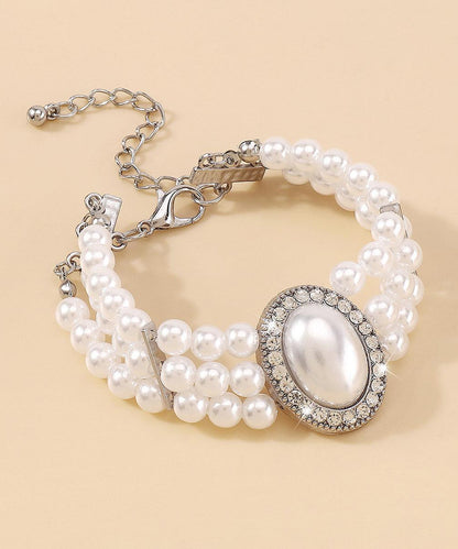 Elegant Gold Copper Alloy Pearl Zircon Resin Tassel Chain Bracelet YI001