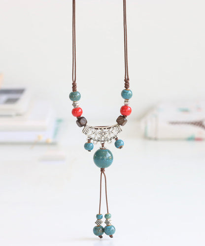 Handmade Bronze Coppery Woven Ceramics Hollow Out Tassel Pendant Necklace TX006