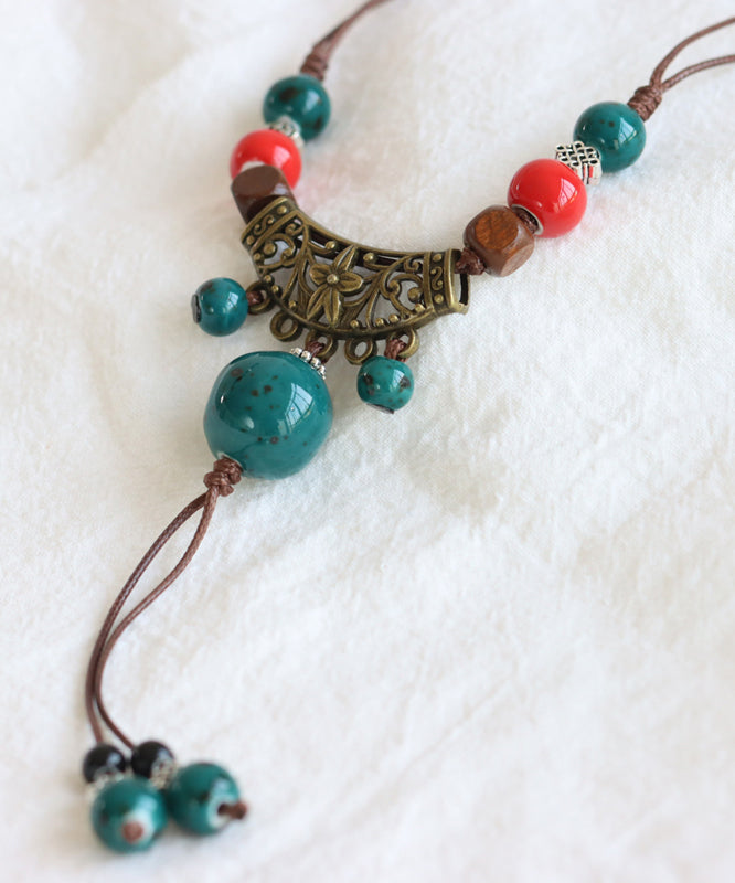 Handmade Bronze Coppery Woven Ceramics Hollow Out Tassel Pendant Necklace TX006