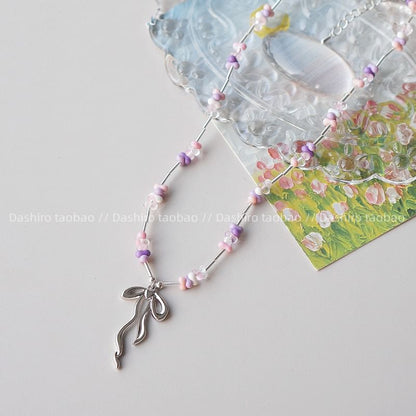 Necklace Irregular Beaded Pendant Bow