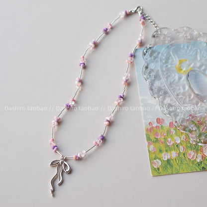 Necklace Irregular Beaded Pendant Bow