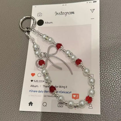 Faux with Pearl Lanyard Bow Phone Strap Pad