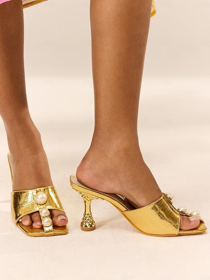 Pearl Sculptural Accents with Gold Mules and Luxurious Leather